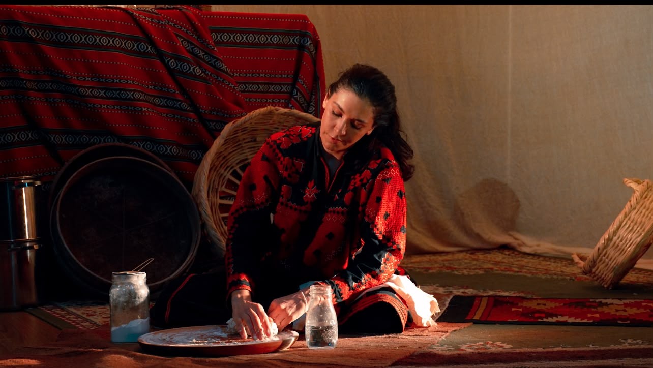 Nicole Shamoun working with food and objects in rehearsal